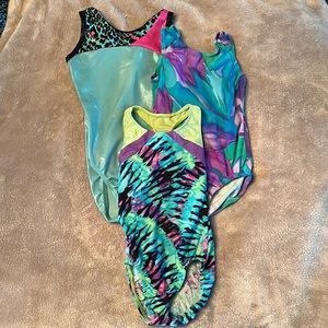 Set of three gymnastics leotards- child size small
